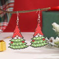Wooden Christmas earrings with geometric Christmas tree and water drop snowman designs featuring Santa Claus motifs