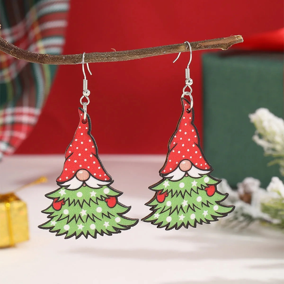 Wooden Christmas earrings with geometric Christmas tree and water drop snowman designs featuring Santa Claus motifs