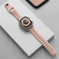 Fluoro rubber Apple Watch replacement band in multiple colours with T buckle, shown next to an Apple Watch.