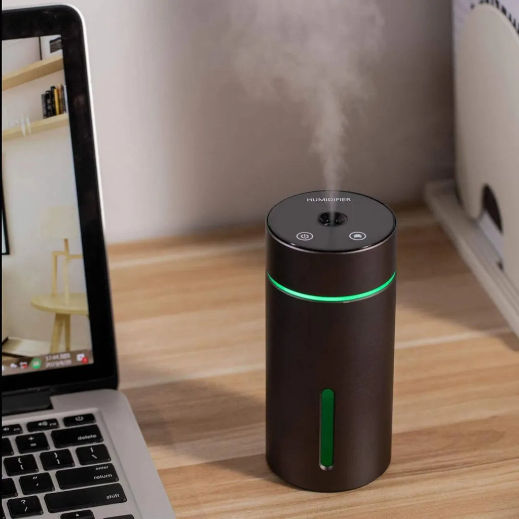 Black aluminium alloy car air humidifier with 260ml capacity and USB cable shown next to scale