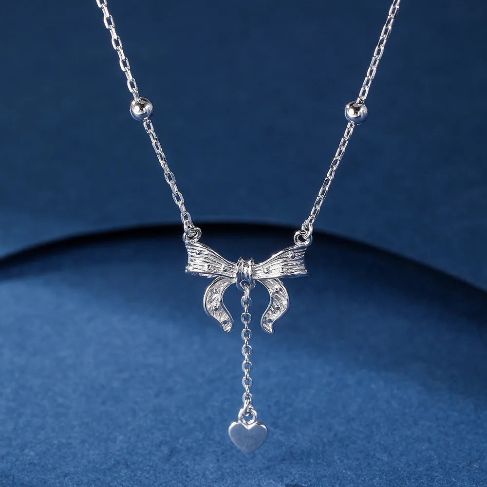 S925 silver butterfly heart necklace with bow detail on adjustable 40-45cm chain