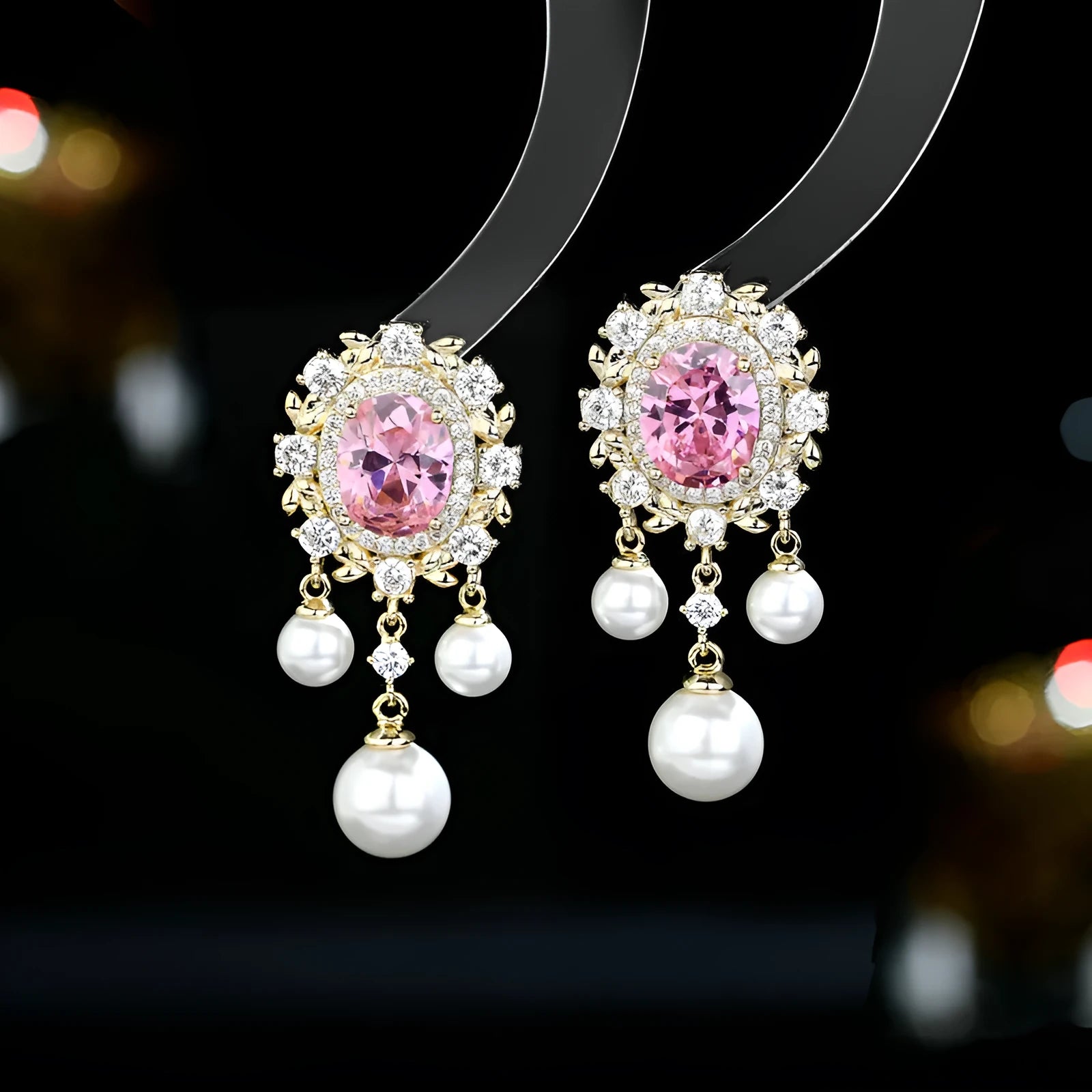 Oval geometric copper drop earrings with pearl elements, inlaid zircon treatment, and tassel detailing in light purple colour