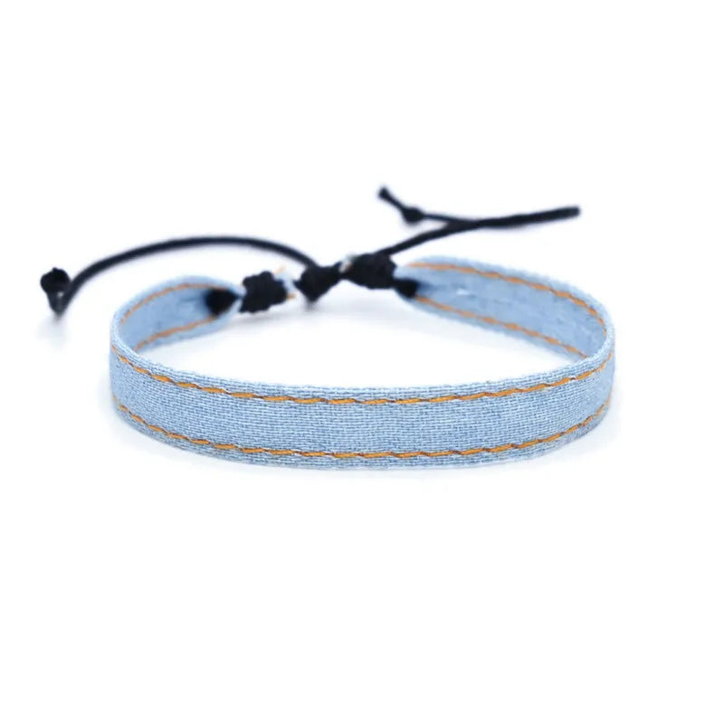 National style denim fabric unisex bracelet carrying strap in a selected colour.