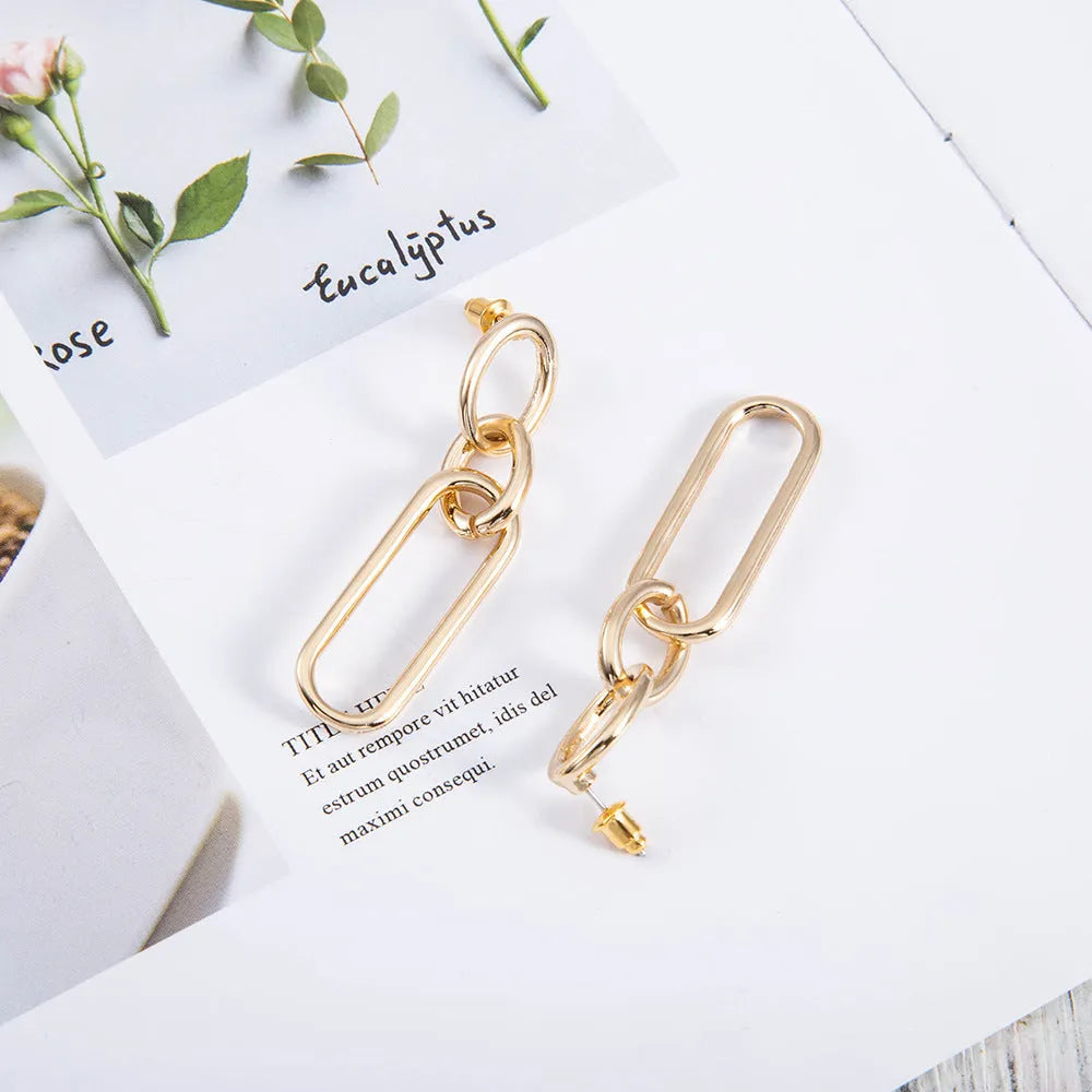 Sterling silver geometric hoop earrings for women with ring and line design elements