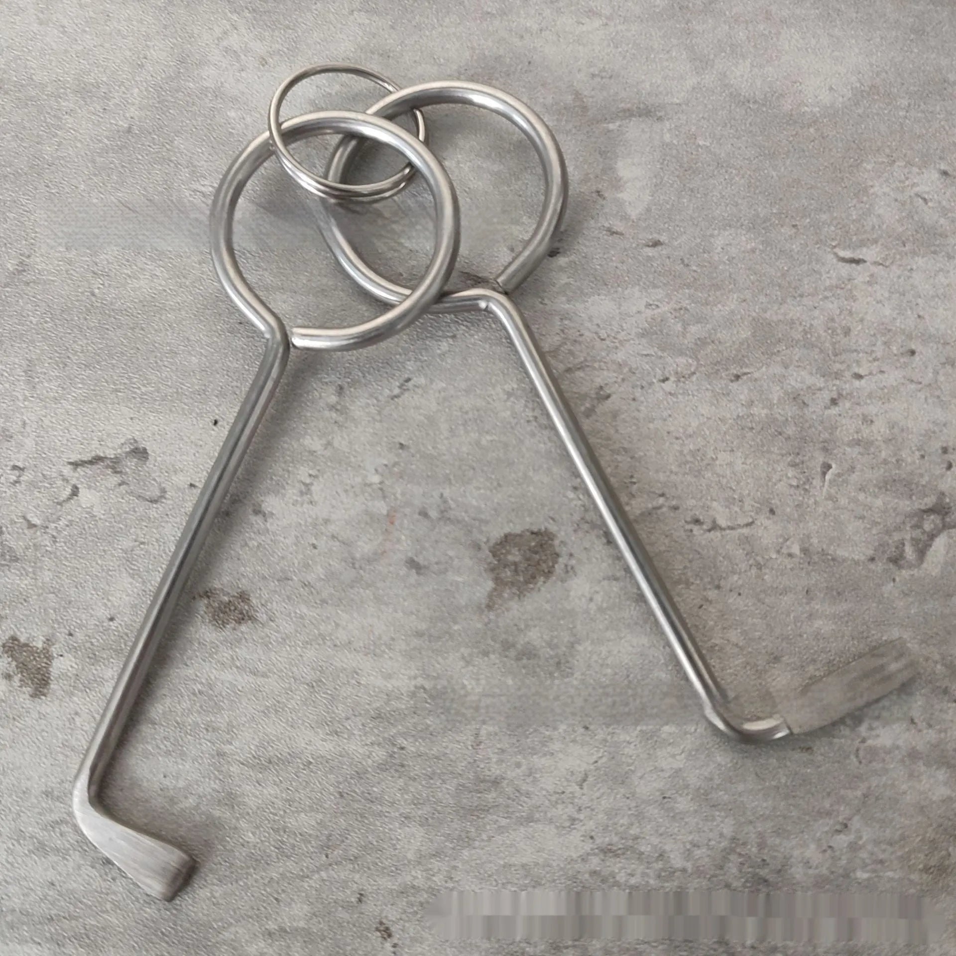 Two alloy wrench tools from portable household maintenance set