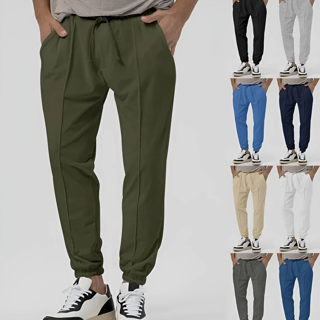 Men's gray elastic track sweatpants with straight-leg tapered design and mid waist