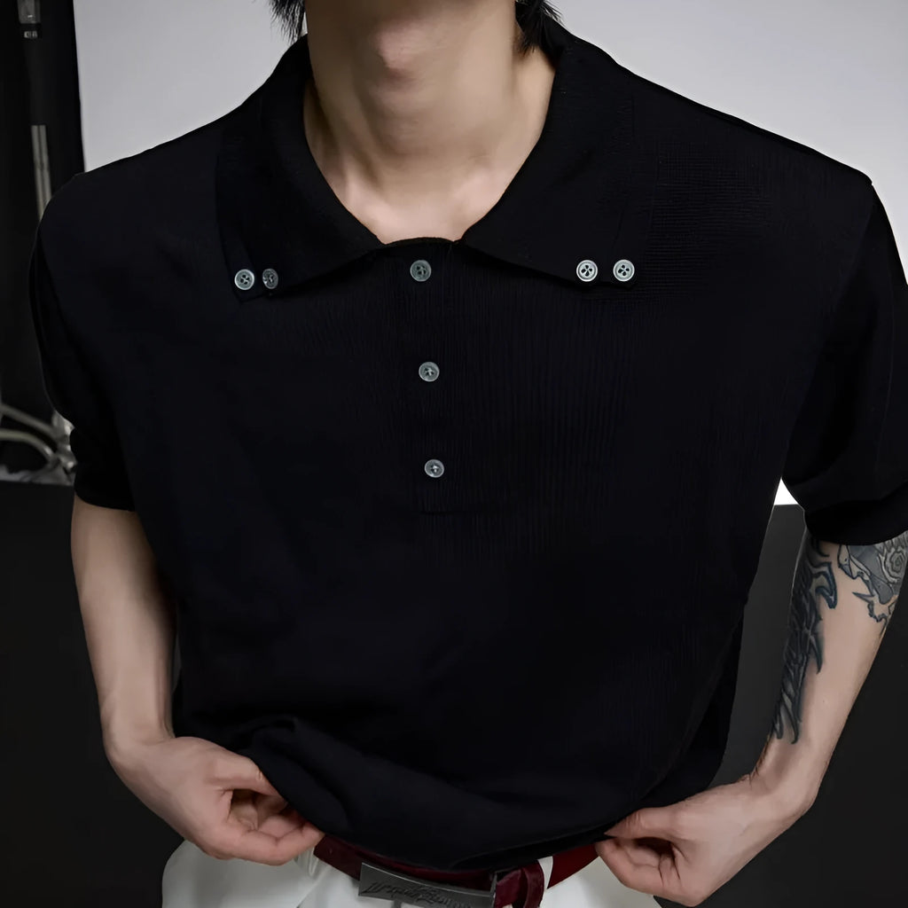 Man wearing a grey double collar knit short sleeve t-shirt.