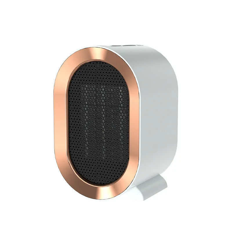 Compact black desktop electric fan heater with mechanical control dials and a safety grille.