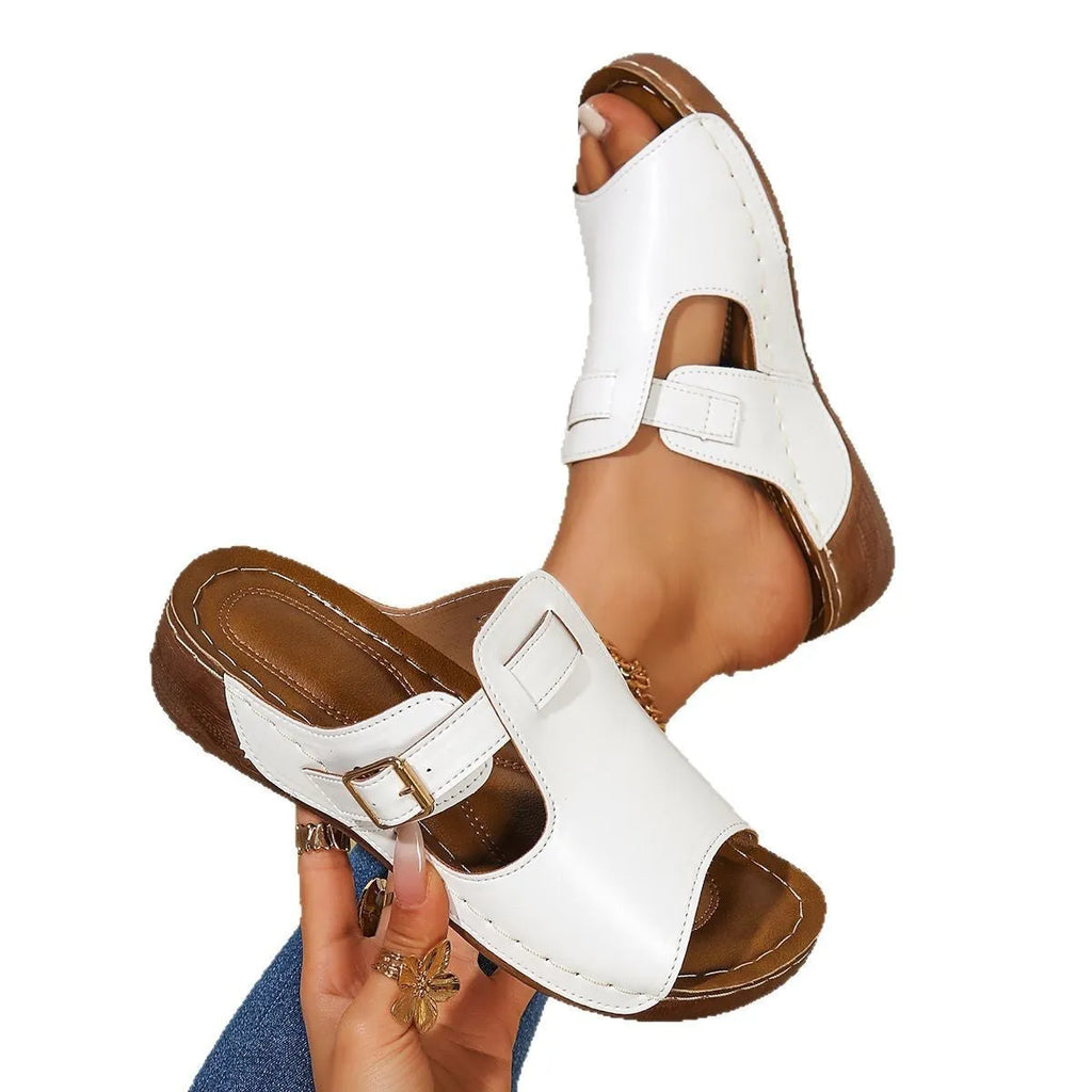 Women's light pink Roman-style slippers with a fish mouth toe bracket and EVA sole.