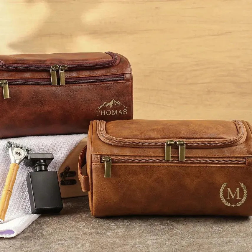 Men's black PU travel bag with a separate makeup pouch included