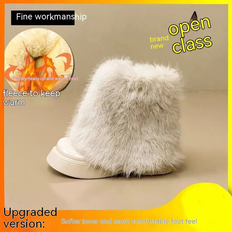 Women's black fleece-lined snow boots with rubber sole and mid heel