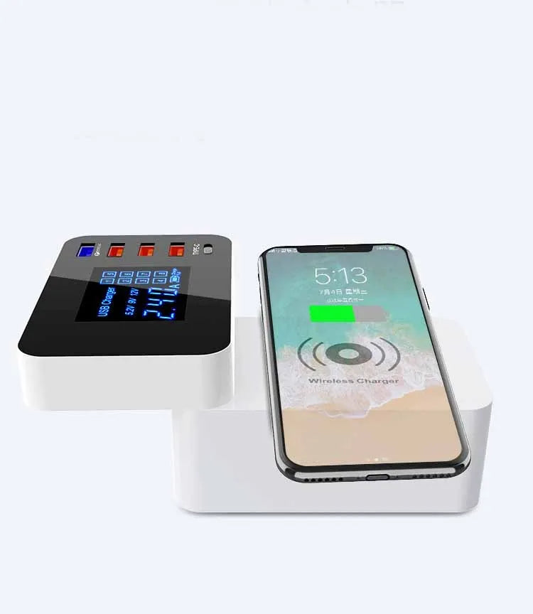 White multi USB port fast charger with wireless charging pad on top, showing four USB ports and UK plug adapter