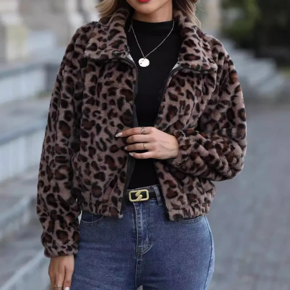 Women's loose leopard print plush coat with zipper and raglan sleeves on a hanger