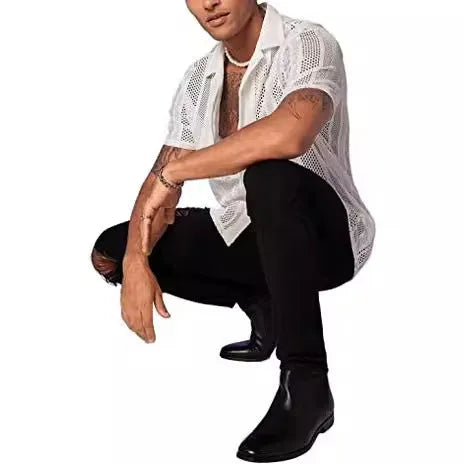 Man wearing a black knitted short-sleeved button shirt cardigan with a jacquard texture.