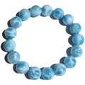 Blue Bodhi bracelet with sea-pattern crystal beads and pearl accents in Maillard style on wrist