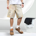 Light blue men's denim shorts with ripped detailing and a straight-leg cut