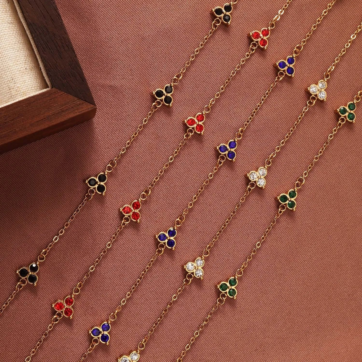 Women's geometric triangular bracelet with zircon gemstone in stainless steel gold tone or steel tone finish