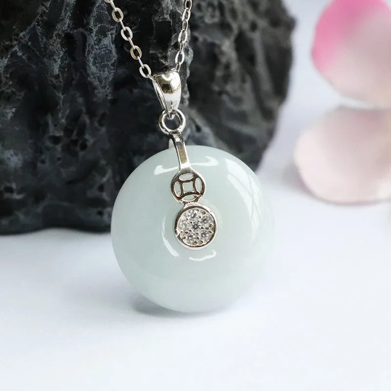S925 silver inlaid natural emerald round geometric pendant 18x6mm on white background
