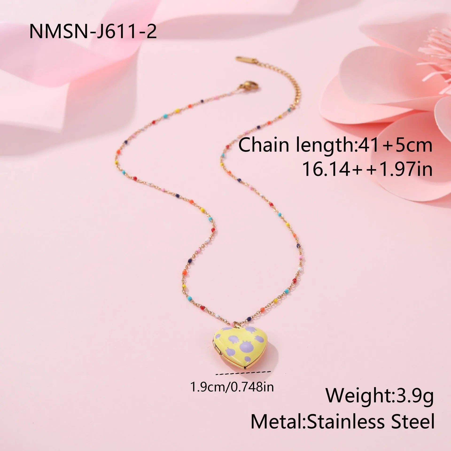 Gold-plated heart-shaped fruit pendant necklace on a stainless steel chain, showing grape design detail.