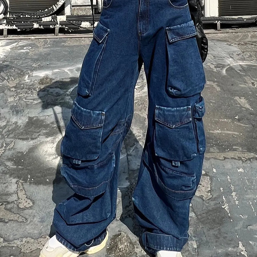 Dark blue women's distressed wide-leg jeans with a high waist and multiple utility pockets.