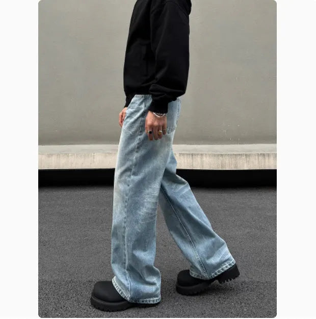 Men's blue retro whisker washed straight jeans with medium-high waist and visible stitching