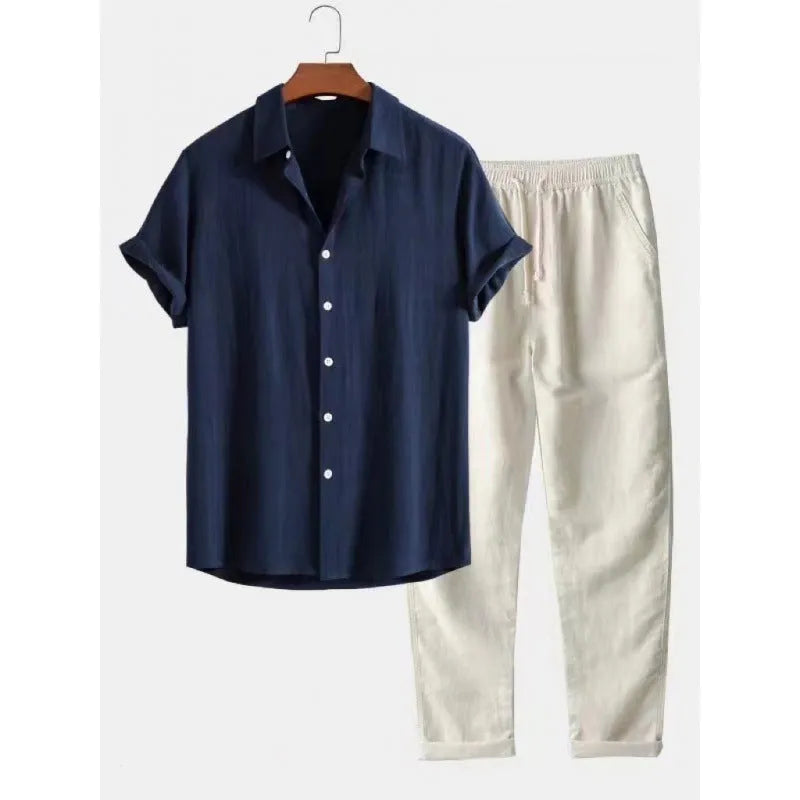 Men's light coloured linen-look casual short sleeve shirt and trouser two-piece suit set on a hanger.