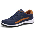 Round toe non-slip wear-resistant mesh sports sneakers in blue on a light background