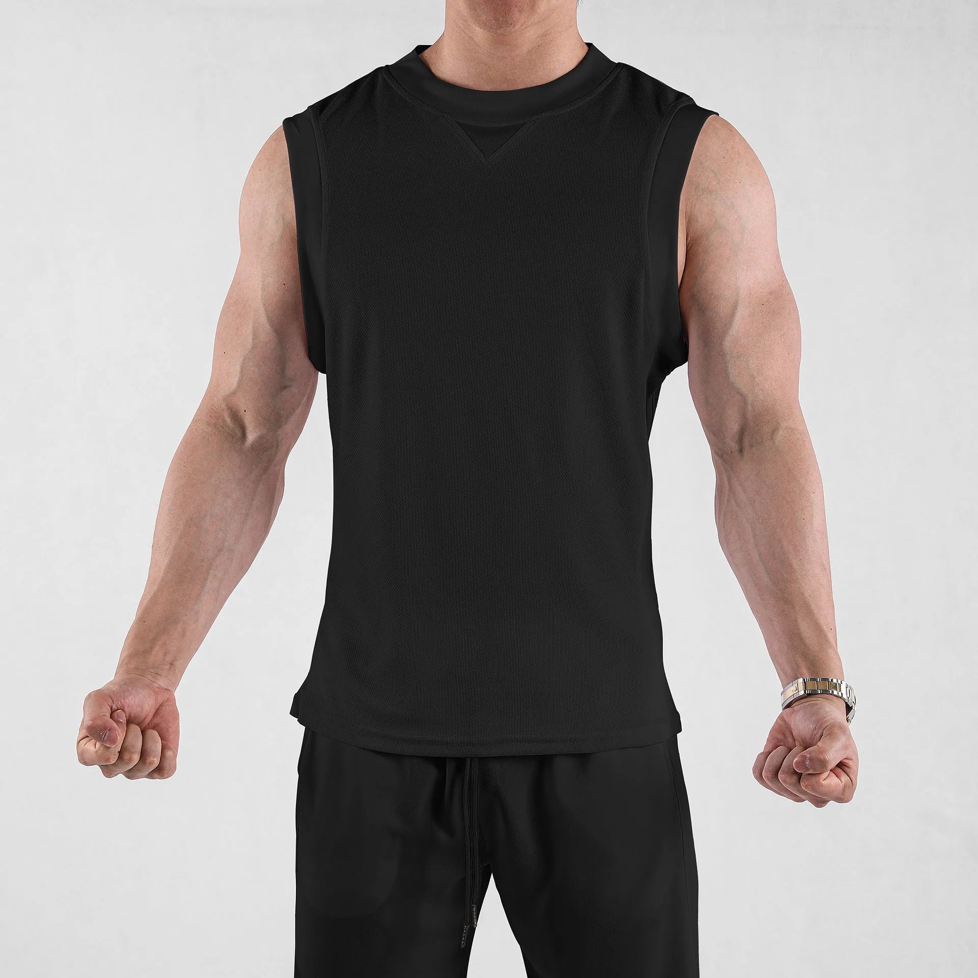 Men's loose-fit athletic vest in white or black with quick-dry polyester for summer sports
