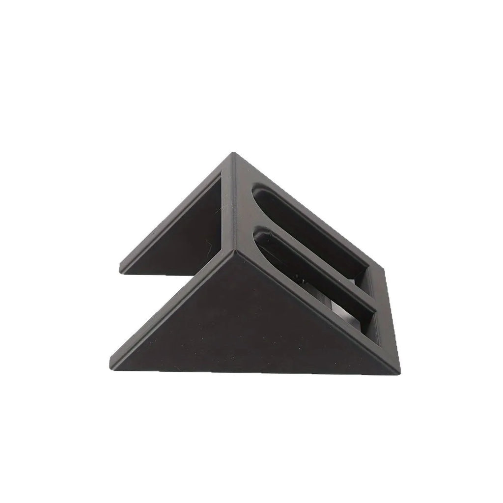 Black plastic pistol display stand with punk-style moulding for 1:1 scale gun models.