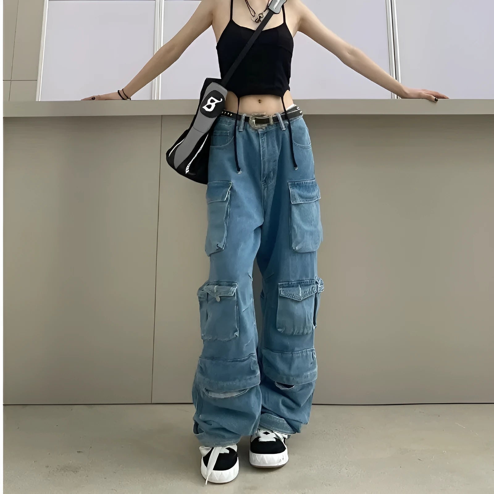 Women's high waist wide leg trousers with tie-dyed denim and multiple pockets in blue colour