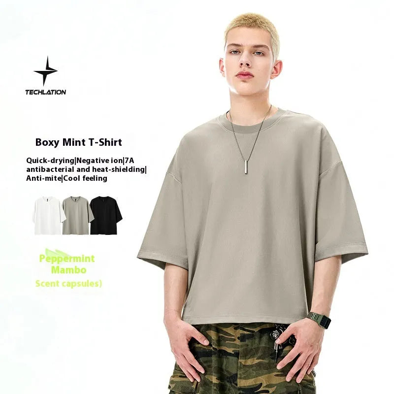 Men's sand grey loose fit short sleeve cotton polyester t-shirt on a hanger.