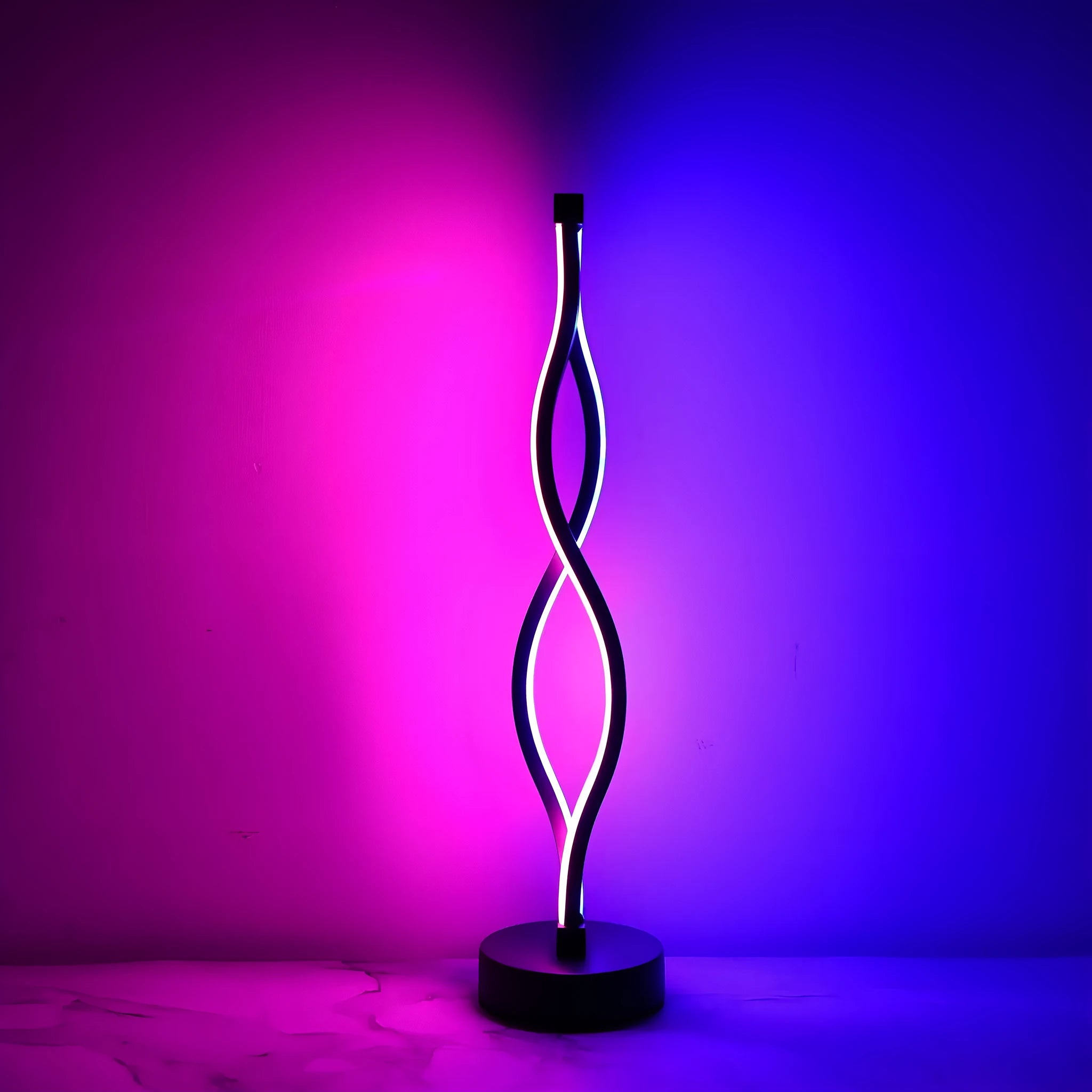 Black aluminium desk lamp with touch dimming controls and USB power cable