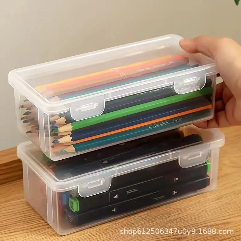 Large clear plastic pencil storage box filled with colouring pencils and crayons.