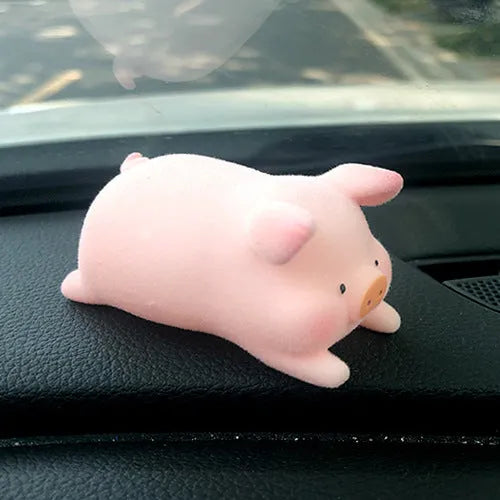 Cute resin cartoon pig car decoration accessory for dashboard.