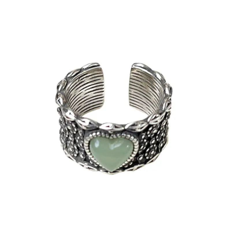 Adjustable heart-shaped ring with wide moon face in white or green colours