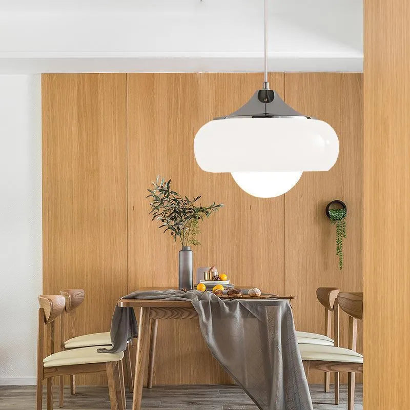 Bauhaus three-headed glass egg tart pendant light in retro style, shown in milk white.
