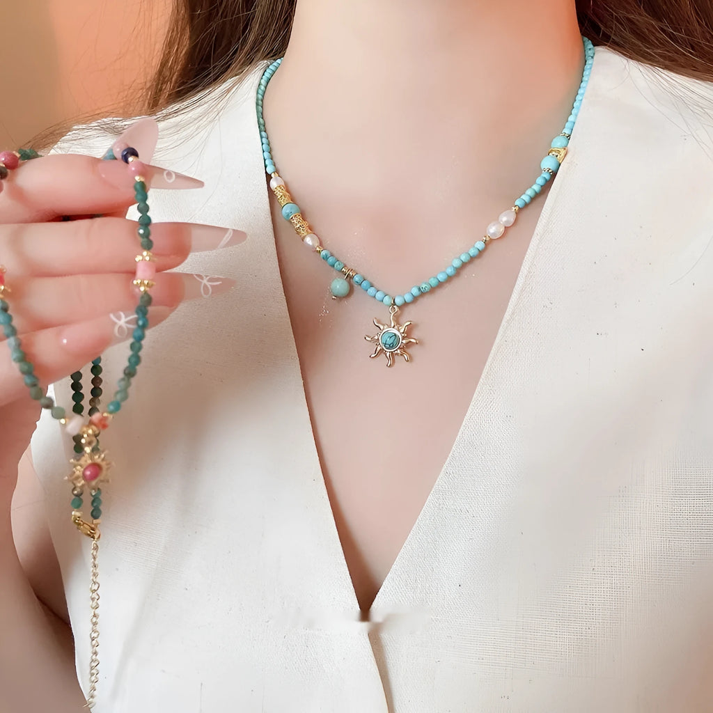 Freshwater pearl necklace with geometric stone sun pendant on clavicle chain