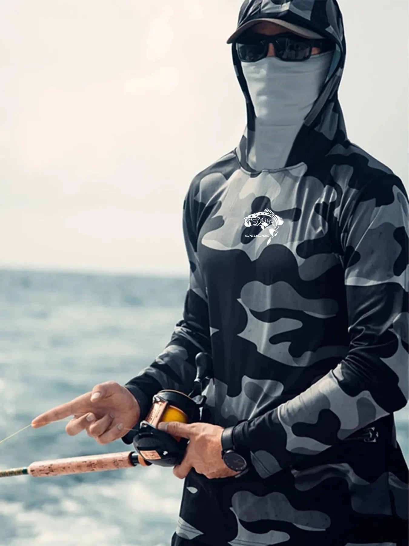 Huk long sleeve fishing hoodie shirt with mesh side panels and UPF 50+ protection.