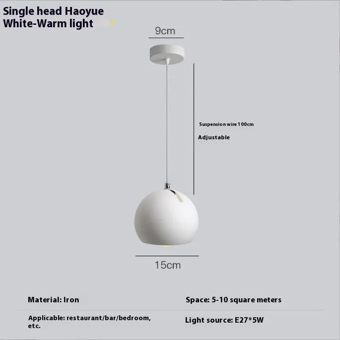 Post-modern ball chandelier table lamp in Moon White or Obsidian Black finish.