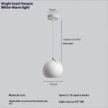 Post-modern ball chandelier table lamp in Moon White or Obsidian Black finish.