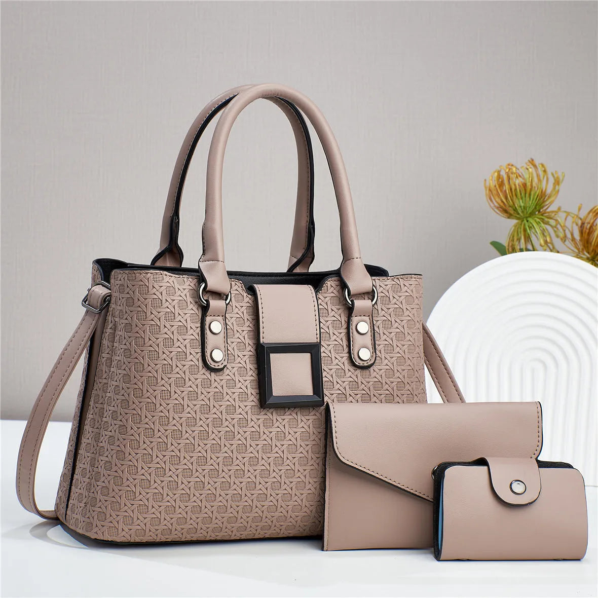 Textured weave design women's crossbody bag in apricot colour, showing internal organiser compartments.