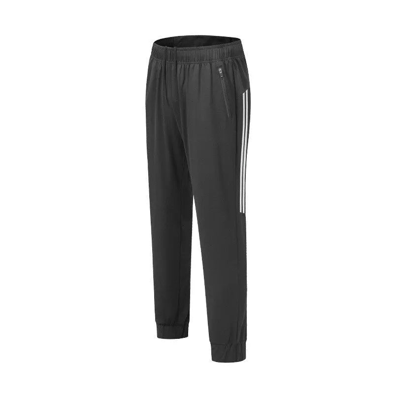Men's black running trousers with mid waist design and polyester fabric for exercise activities