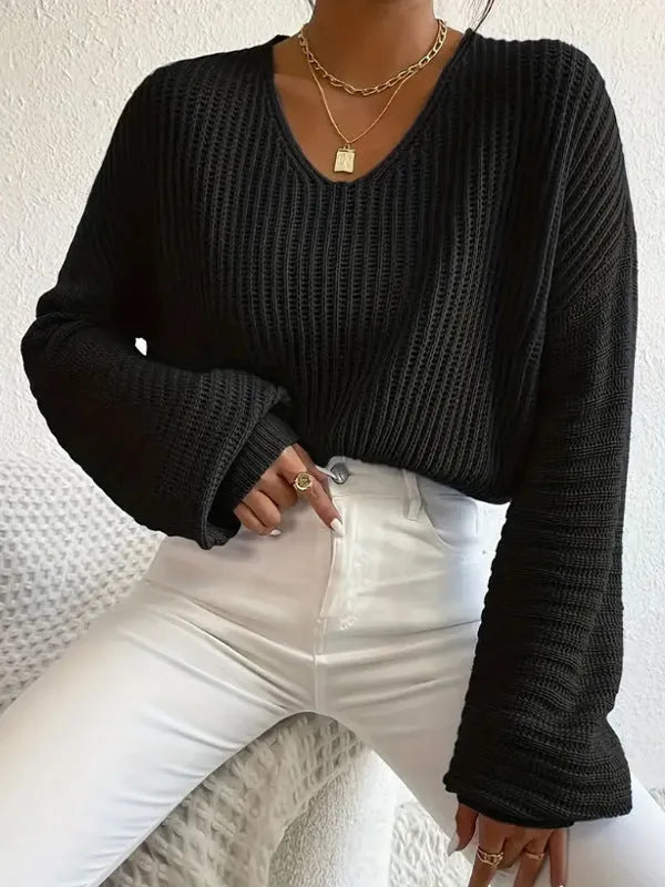 Women's loose fit long sleeve pullover top in solid colour with regular sleeves