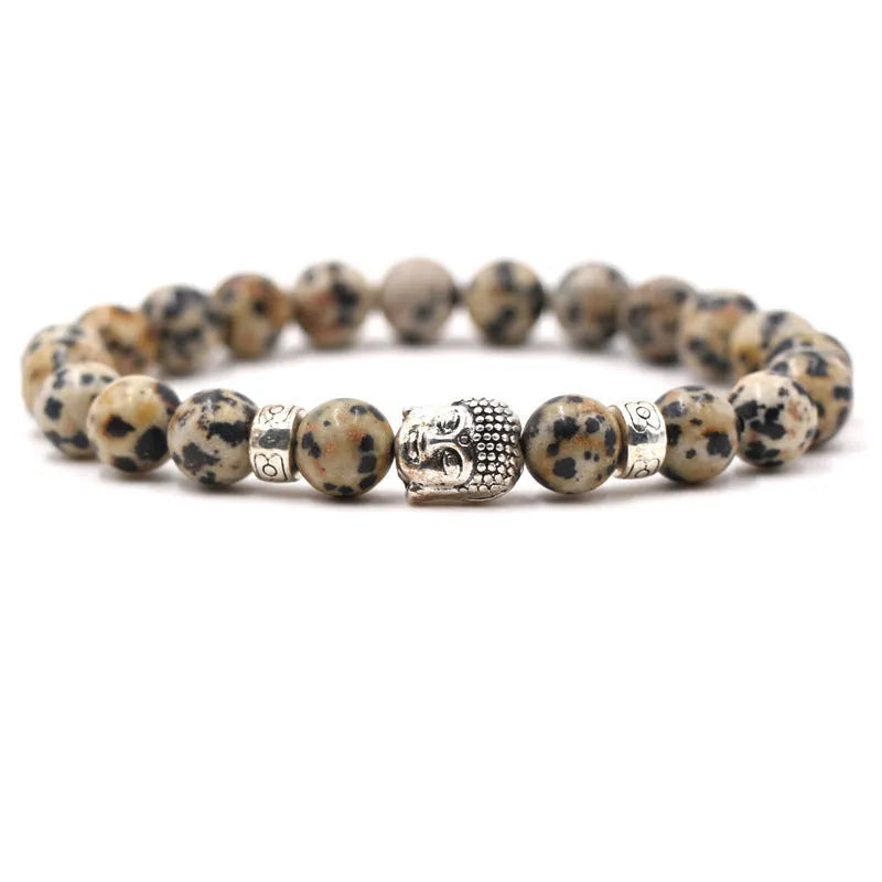 Tigereye stone Buddha head stretch bracelet with 8mm beads on a wrist.