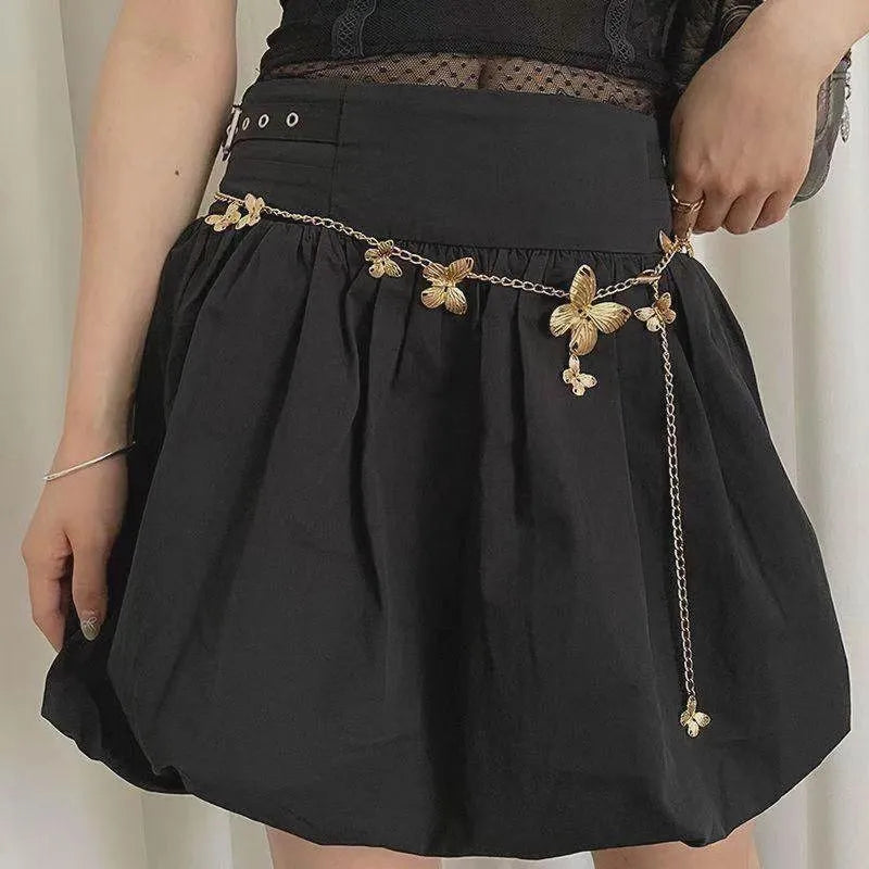 Golden butterfly waist chain belt with alloy construction showing 104cm length measurement