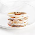Original baroque freshwater pearl woven girls' bracelet in leather with geometric ingot centrepiece