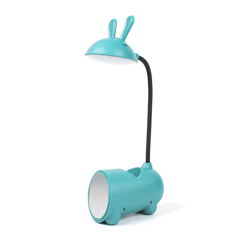Cartoon-style USB table lamp with pen storage compartment in green colour