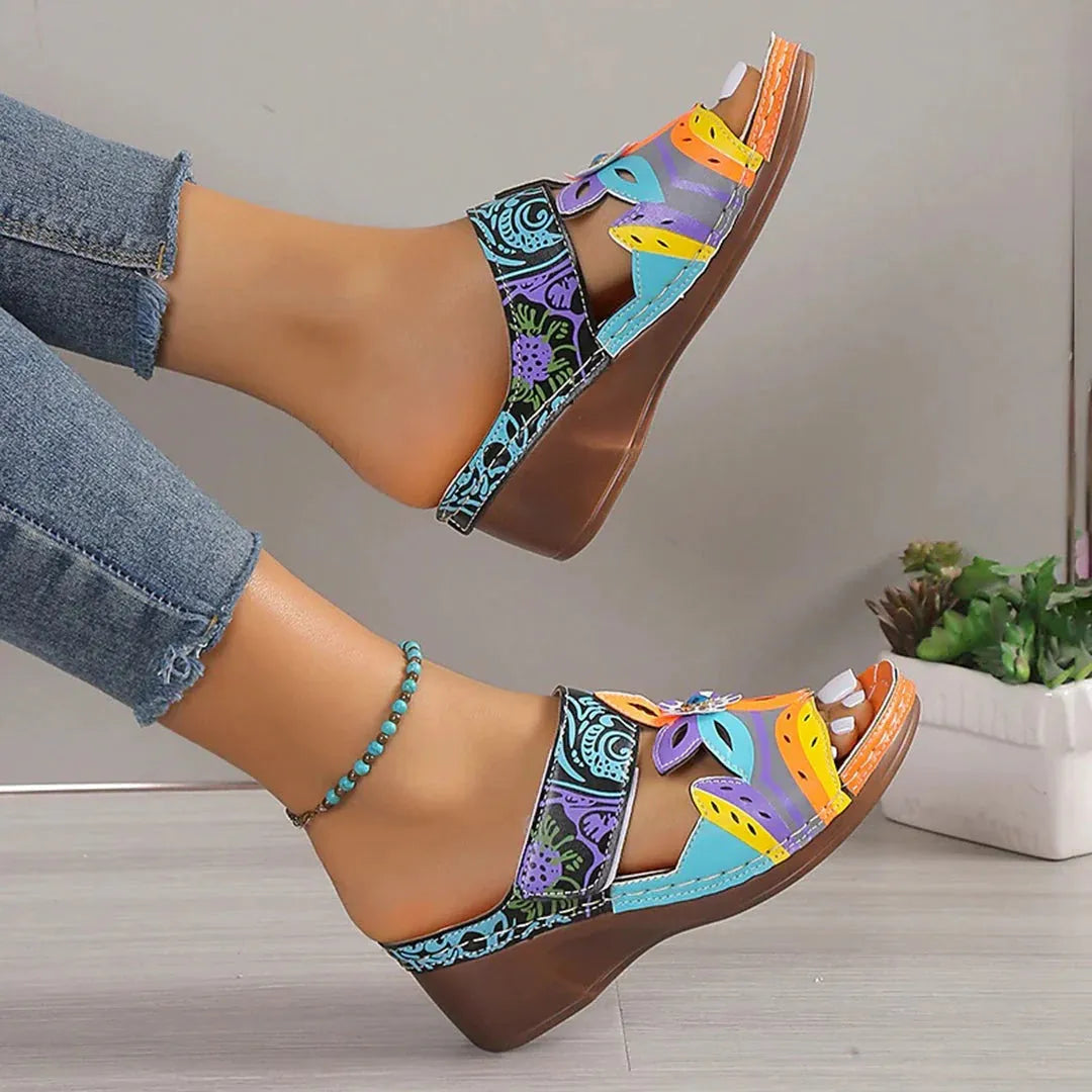 Women's colourful leather sandals with ethnic totem design in black, available in sizes 35 to 43.