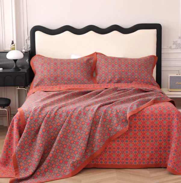 Cotton gauze three-piece bedding set with botanical plant and flower patterns including blanket and two pillowcases