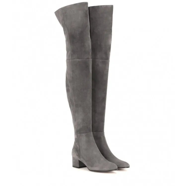 Grey women's flat over-the-knee suede boots with a pointed toe and low rubber heel.